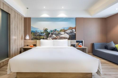 Imagen de la habitación del Hotel Atour Hefei Changjiang Road. Foto 16