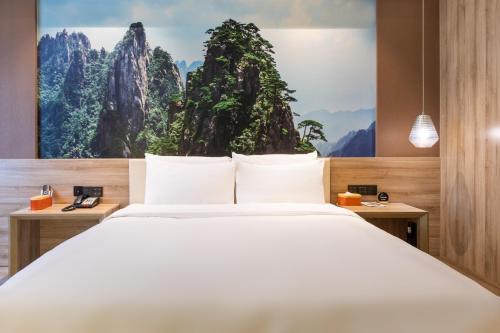 Imagen de la habitación del Hotel Atour Hefei Changjiang Road. Foto 19