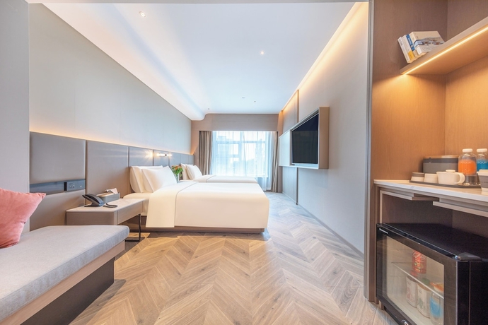 Imagen de la habitación del Hotel Atour, Hisense Plaza, May Fourth Square, Qingdao. Foto 2