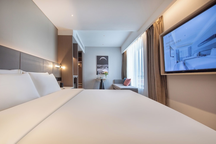 Imagen de la habitación del Hotel Atour, Hisense Plaza, May Fourth Square, Qingdao. Foto 8