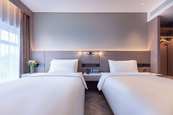 Imagen de la habitación del Hotel Atour, Hisense Plaza, May Fourth Square, Qingdao. Foto 11