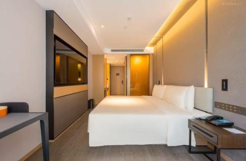 Imagen de la habitación del Hotel Atour Hotel Beijing Asian Games Village National Convention Center. Foto 5