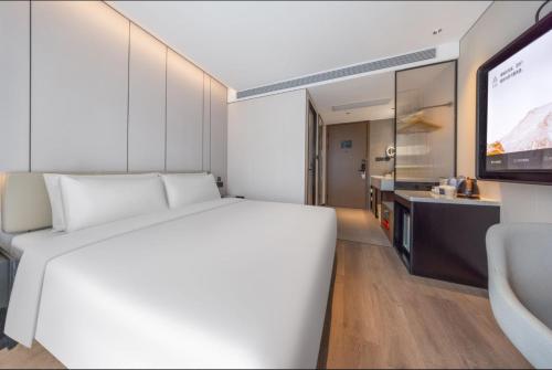 Imagen de la habitación del Hotel Atour Hotel Beijing Sanlitun North Gongti Road. Foto 4