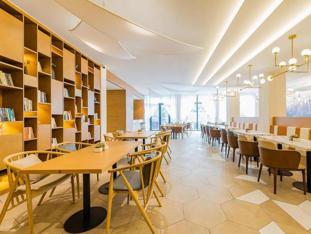 Imagen del bar/restaurante del Hotel Atour Hotel Jimei University. Foto 12