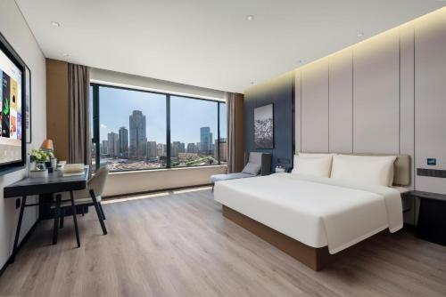Imagen de la habitación del Hotel Atour Hotel Qingdao Tangdao Bay Jinggangshan Station. Foto 4