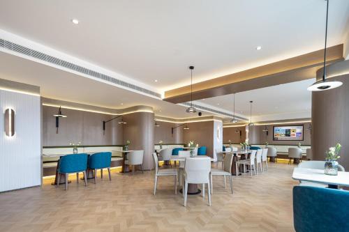 Imagen de los interiores del Hotel Atour Hotel Qingdao Tangdao Bay Jinggangshan Station. Foto 7