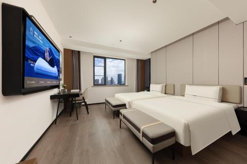 Imagen de la habitación del Hotel Atour Hotel Shanghai People's Square Nanjing Road Pedestrian Street. Foto 2