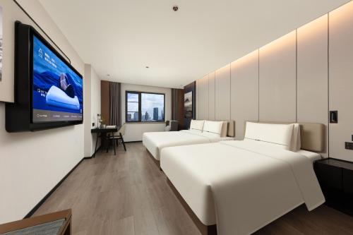 Imagen de la habitación del Hotel Atour Hotel Shanghai People's Square Nanjing Road Pedestrian Street. Foto 14