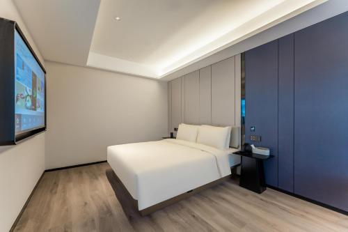Imagen de la habitación del Hotel Atour Hotel ShanghaiPeople's Square Xintiandi Subway. Foto 20