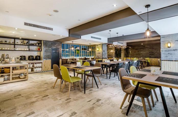 Imagen del bar/restaurante del Hotel Atour Hotel Yuquan. Foto 5