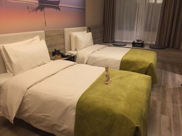 Imagen de la habitación del Hotel Atour Hotel Zhongshan Square Dalian. Foto 6