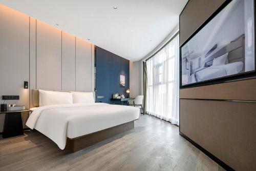 Imagen de la habitación del Hotel Atour Huaihua High-Speed South Railway Station. Foto 17