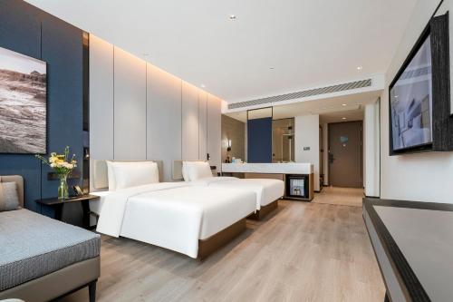 Imagen de la habitación del Hotel Atour Huaihua High-Speed South Railway Station. Foto 18