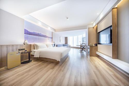 Imagen de la habitación del Hotel Atour Huizhou Huiyang High-speed Railway Station. Foto 11