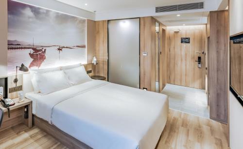 Imagen de la habitación del Hotel Atour Huizhou Huiyang High-speed Railway Station. Foto 12