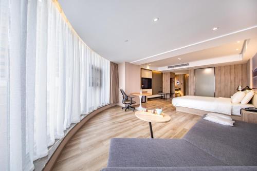Imagen de la habitación del Hotel Atour Huizhou Huiyang High-speed Railway Station. Foto 13