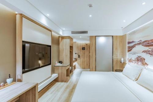 Imagen de la habitación del Hotel Atour Huizhou Huiyang High-speed Railway Station. Foto 14