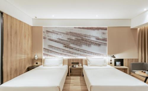 Imagen de la habitación del Hotel Atour Huizhou Huiyang High-speed Railway Station. Foto 16
