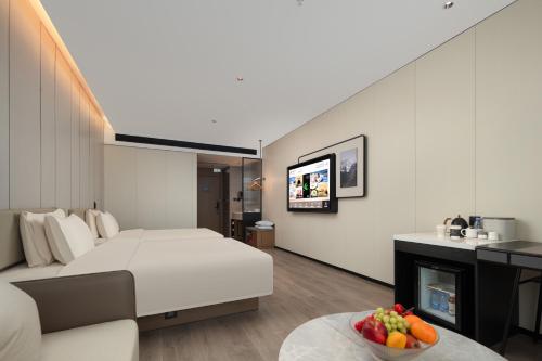 Imagen general del Hotel Atour Jieyang Banyan City Jieyang House. Foto 3