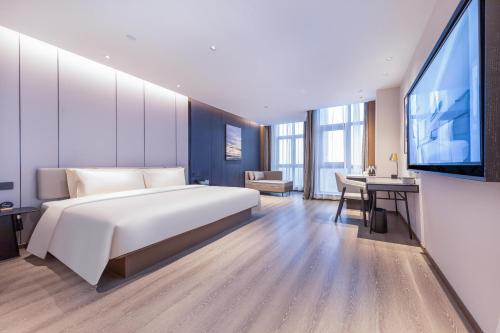 Imagen de la habitación del Hotel Atour Jinan Huashan Huanyu City. Foto 16