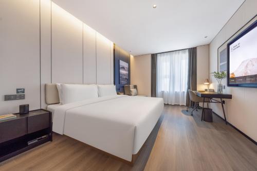 Imagen de la habitación del Hotel Atour Jinan Shandong International Convention and Exhibition Center Ikea. Foto 13