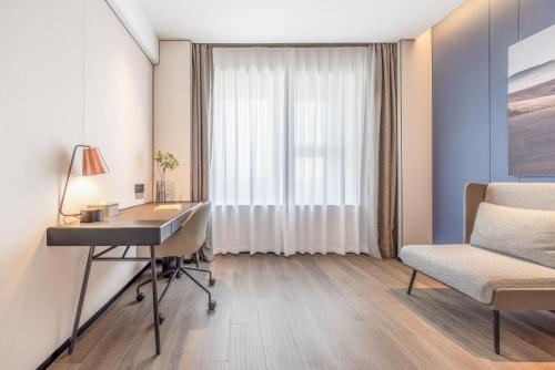 Imagen de la habitación del Hotel Atour Jinan Shandong International Convention and Exhibition Center Ikea. Foto 18