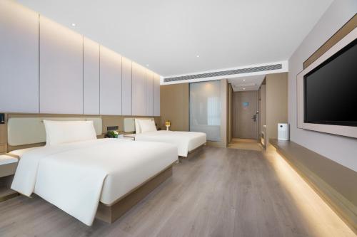 Imagen de la habitación del Hotel Atour Jinan West Railway Station. Foto 8