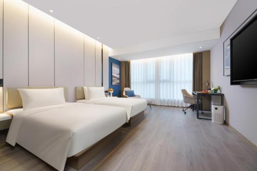 Imagen de la habitación del Hotel Atour Jinan West Railway Station. Foto 10