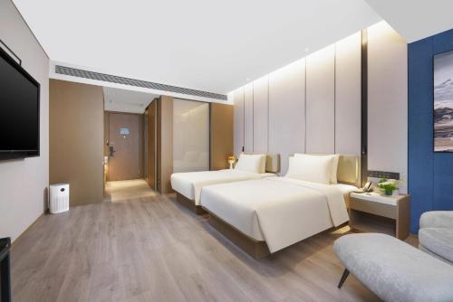 Imagen de la habitación del Hotel Atour Jinan West Railway Station. Foto 11