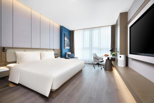 Imagen de la habitación del Hotel Atour Jinan West Railway Station. Foto 13