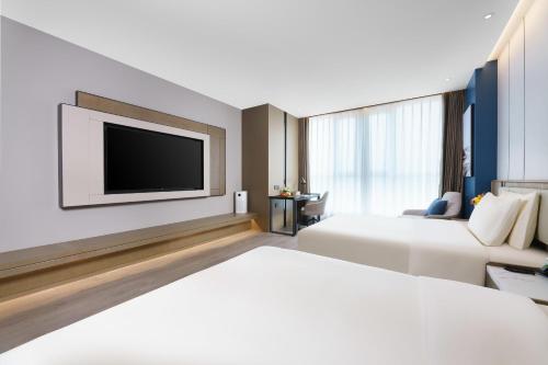 Imagen de la habitación del Hotel Atour Jinan West Railway Station. Foto 16