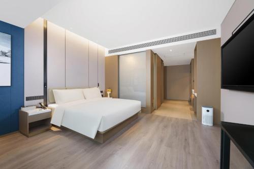 Imagen de la habitación del Hotel Atour Jinan West Railway Station. Foto 19