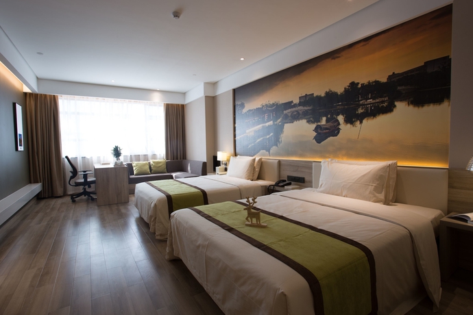 Imagen de la habitación del Hotel Atour Jinji Lake Expo Center Suzhou. Foto 12
