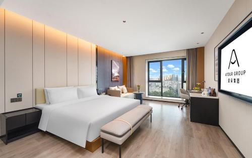 Imagen de la habitación del Hotel Atour Kunming Changshui International Airport Cloud Cube. Foto 14