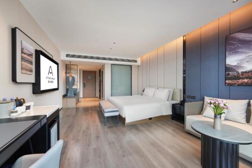 Imagen de la habitación del Hotel Atour Kunming Changshui International Airport Cloud Cube. Foto 16