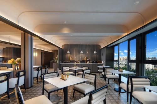 Imagen del bar/restaurante del Hotel Atour Kunming Changshui International Airport Cloud Cube. Foto 11