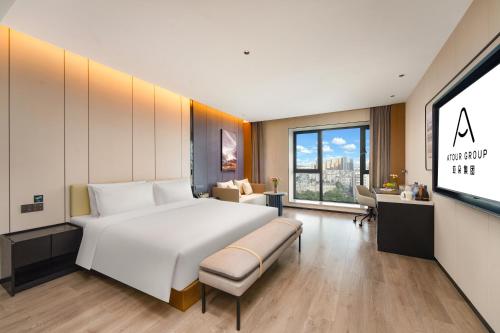 Imagen de la habitación del Hotel Atour Kunming Changshui International Airport Cloud Cube. Foto 17