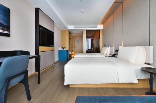 Imagen de la habitación del Hotel Atour Kunming Changshui International Airport. Foto 11