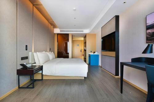 Imagen de la habitación del Hotel Atour Kunming Changshui International Airport. Foto 13