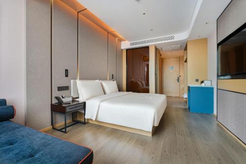 Imagen de la habitación del Hotel Atour Kunming Changshui International Airport. Foto 14