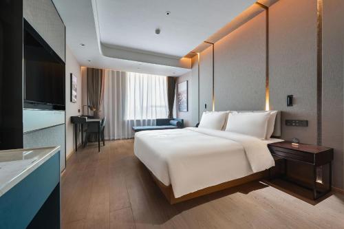 Imagen de la habitación del Hotel Atour Kunming Changshui International Airport. Foto 16