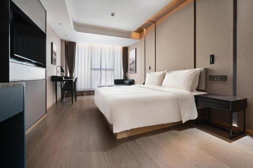 Imagen de la habitación del Hotel Atour Kunming Changshui International Airport. Foto 17