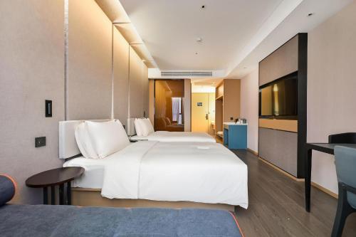Imagen de la habitación del Hotel Atour Kunming Changshui International Airport. Foto 18