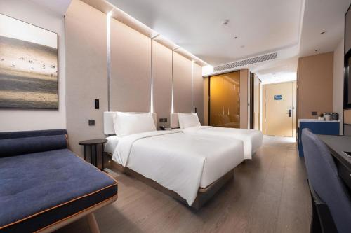 Imagen de la habitación del Hotel Atour Kunming Changshui International Airport. Foto 19