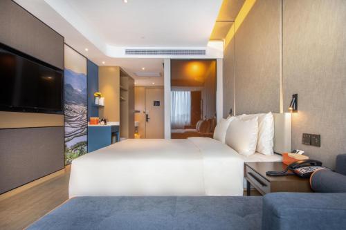 Imagen de la habitación del Hotel Atour Kunming Cuihu. Foto 13