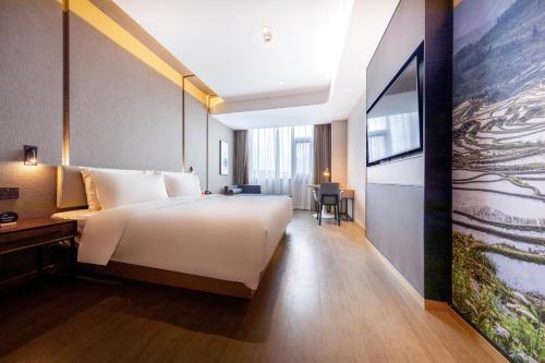 Imagen de la habitación del Hotel Atour Kunming Cuihu. Foto 15
