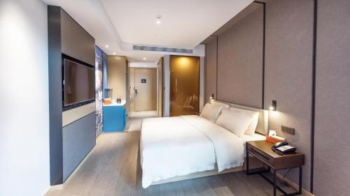 Imagen de la habitación del Hotel Atour Kunming Cuihu. Foto 19