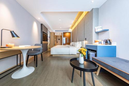 Imagen de la habitación del Hotel Atour Kunming Cuihu. Foto 20