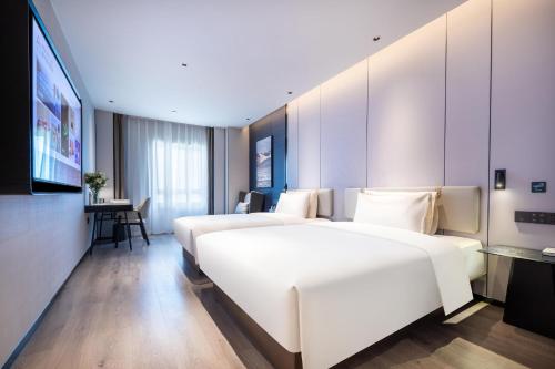 Imagen de la habitación del Hotel Atour Kunming Guangfu Road Haile World. Foto 11