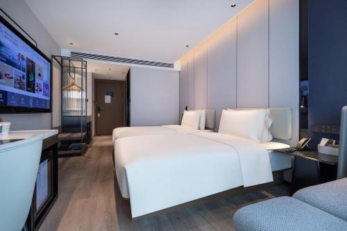 Imagen de la habitación del Hotel Atour Kunming Guangfu Road Haile World. Foto 15